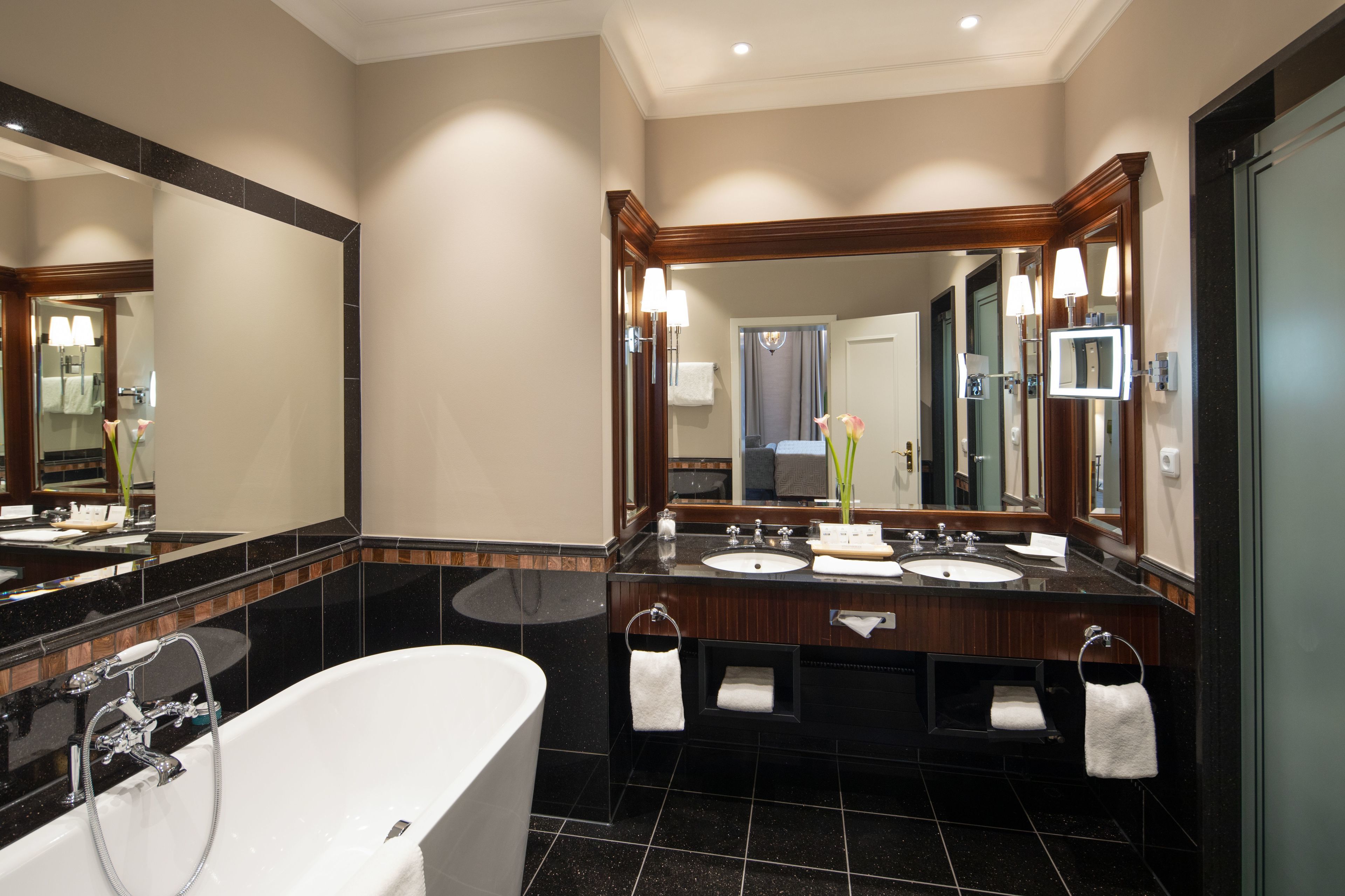 rainfall showerhead, hair dryer, bathrobes, slippers