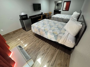 Deluxe-Zimmer, 2 Doppelbetten, Nichtraucher, Kühlschrank und Mikrowelle | Kostenloses WLAN, Bettwäsche