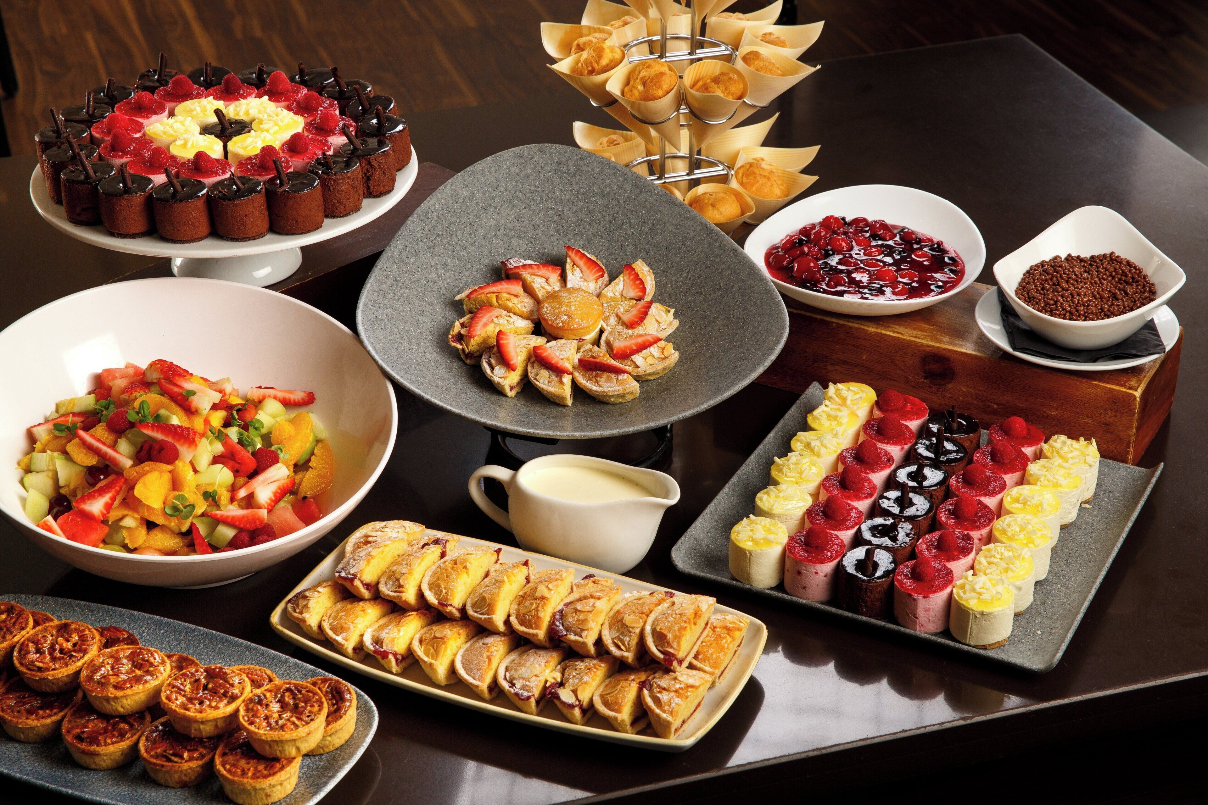 A variety of desserts and pastries on a table.