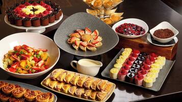 A variety of desserts and pastries on a table.