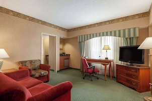 Premium bedding, desk, laptop workspace, iron/ironing board
