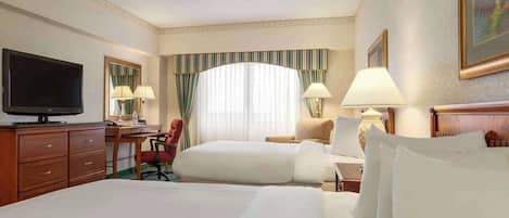 Premium bedding, desk, laptop workspace, iron/ironing board