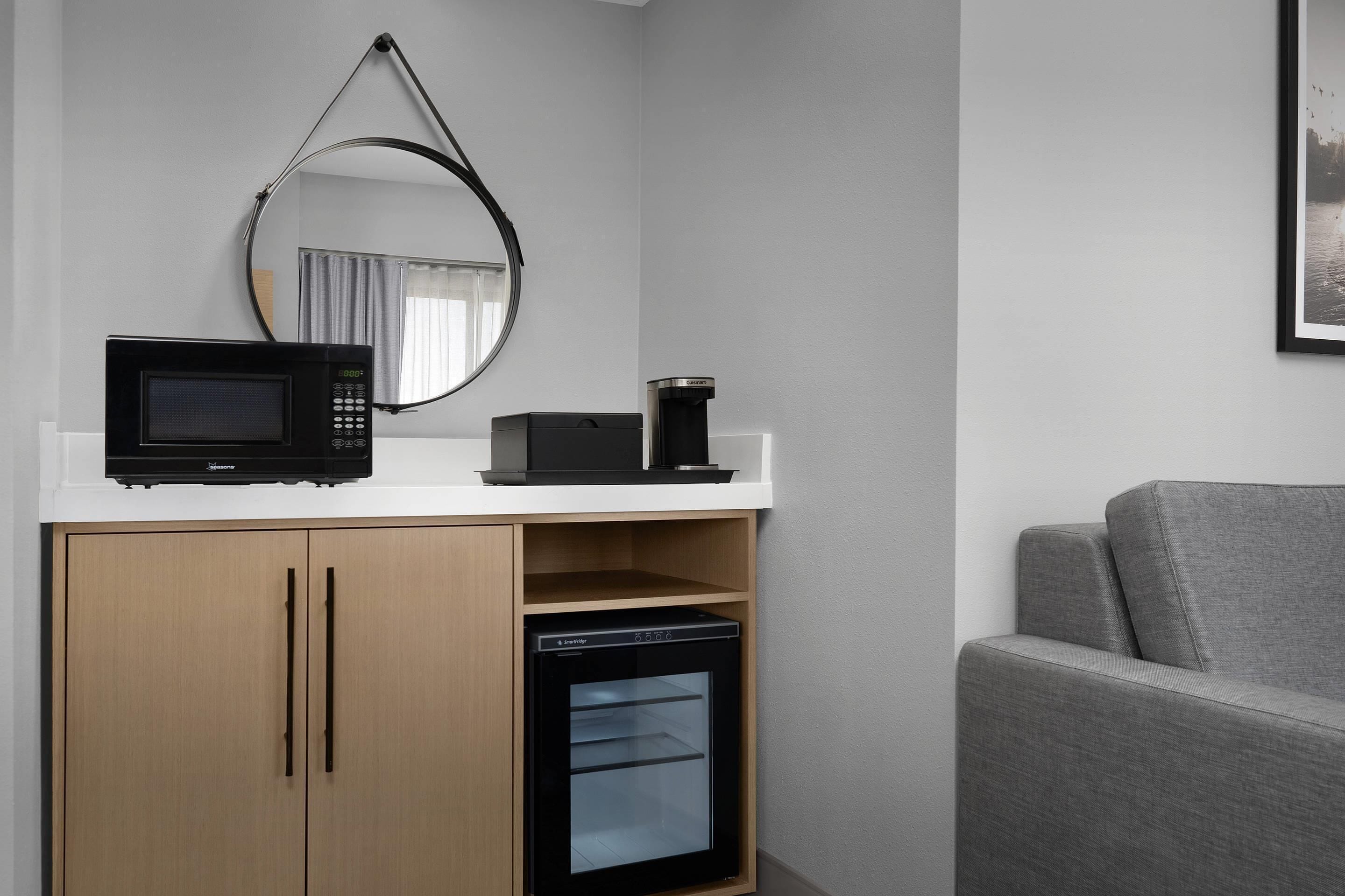 Premium bedding, desk, laptop workspace, iron/ironing board
