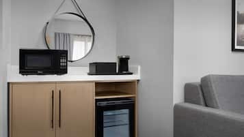 Premium bedding, desk, laptop workspace, iron/ironing board