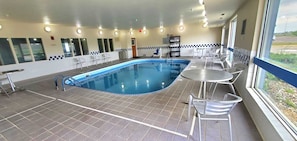 Indoor pool, open 6:00 AM to 11:00 PM, pool loungers