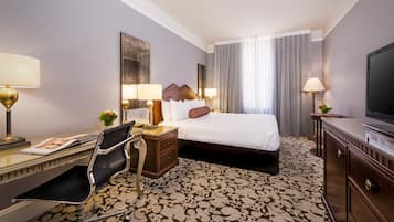 Hypo-allergenic bedding, down duvets, in-room safe, desk
