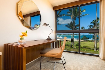 Desk, blackout drapes, iron/ironing board, free cribs/infant beds at Hilton Garden Inn Kauai Wailua Bay, HI