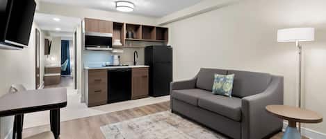 50-inch flat-screen TV with satellite channels, TV, books