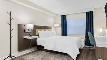 Studio, 1 Queen Bed | In-room safe, individually decorated, individually furnished, desk