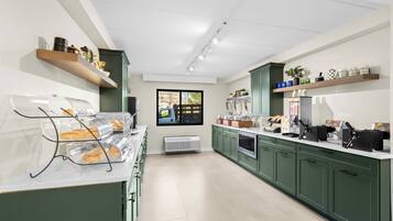 Daily buffet breakfast (USD 10.00 per person)