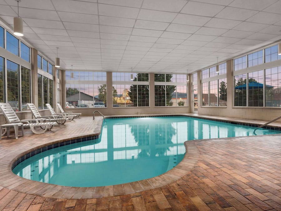 Indoor pool, open 9:00 AM to midnight, pool umbrellas