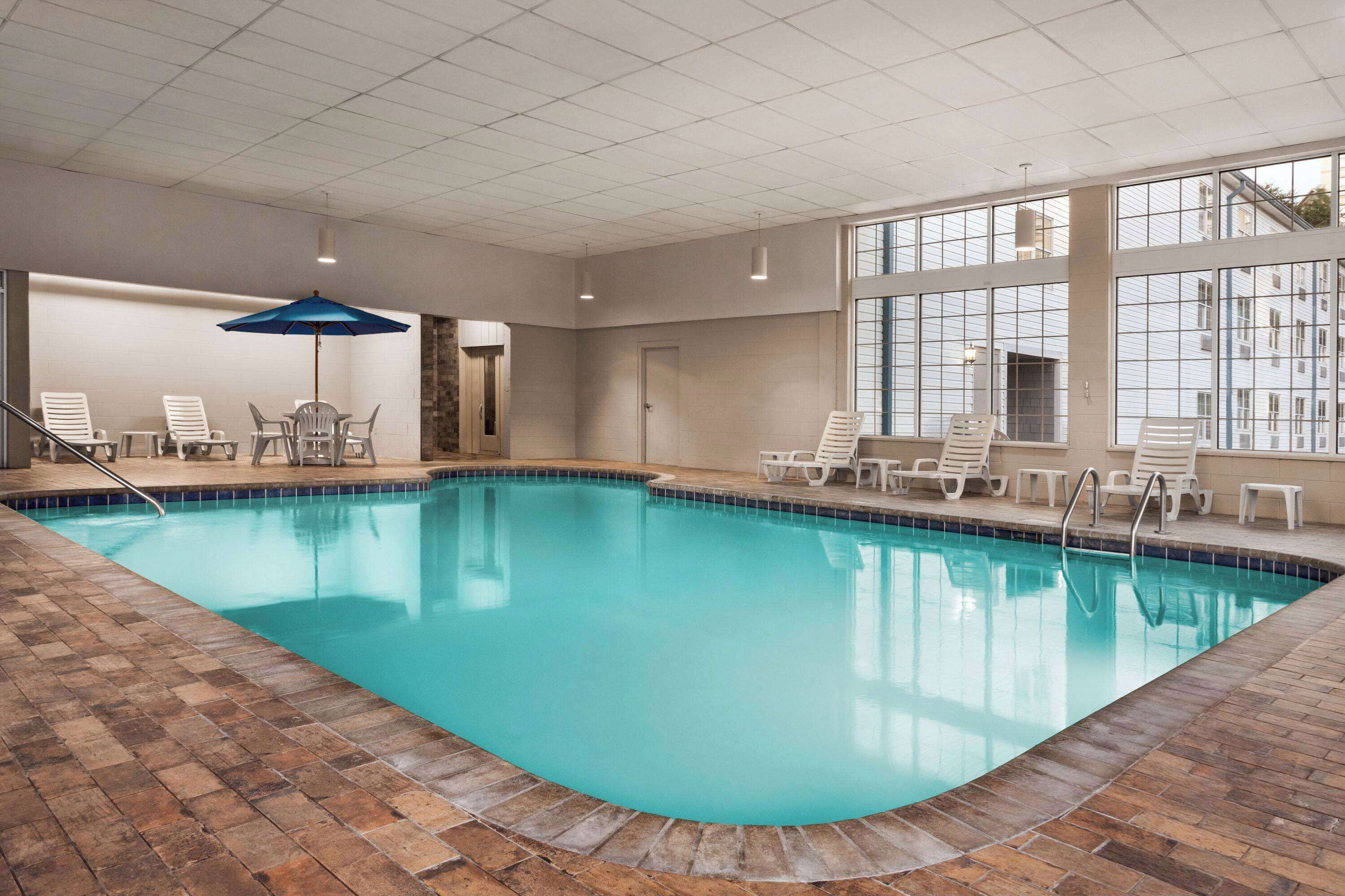 indoor pool, open 9:00 am to midnight, pool umbrellas