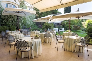 Breakfast, lunch, dinner served; Mediterranean cuisine, garden views