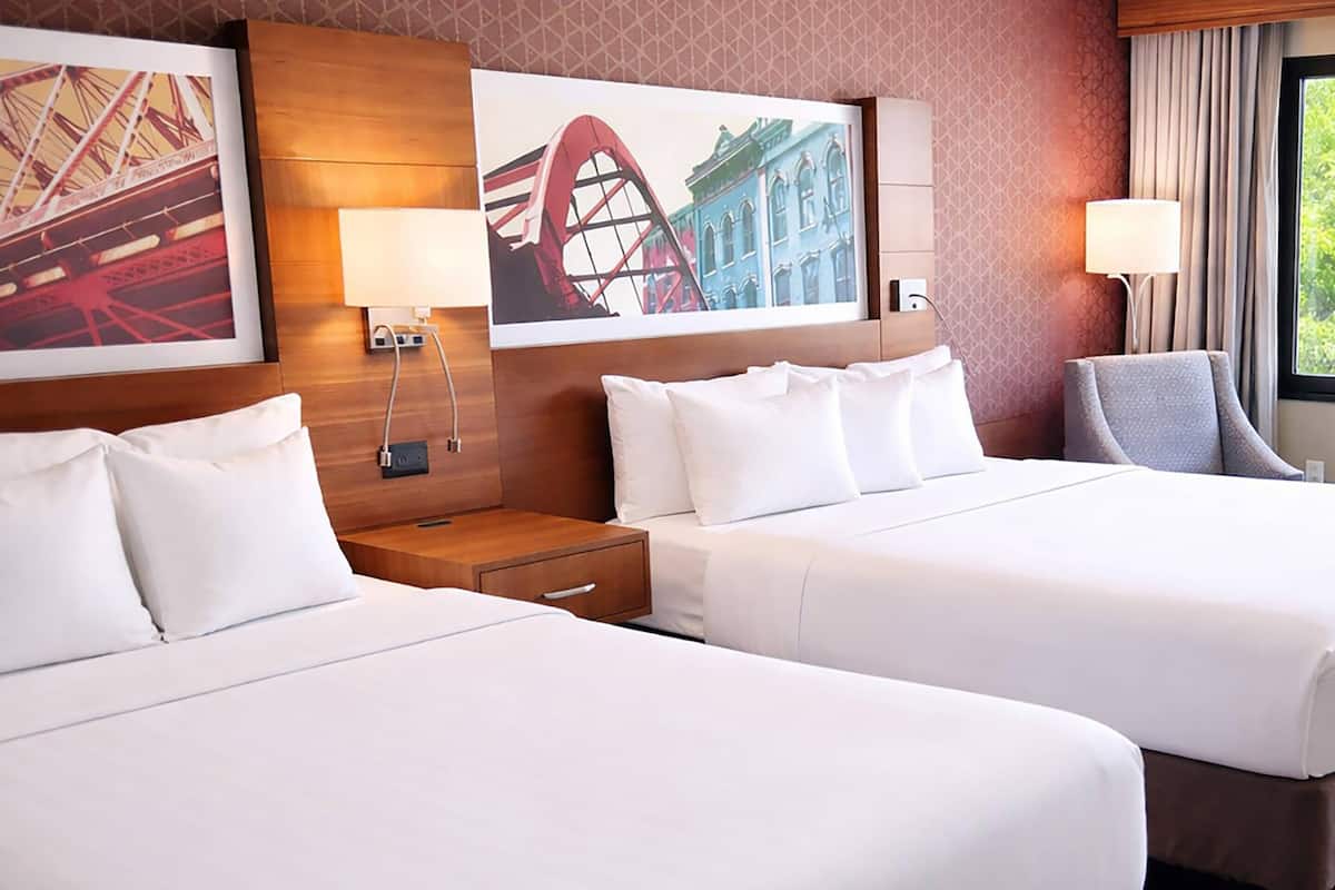 Pillowtop beds, desk, laptop workspace, blackout drapes