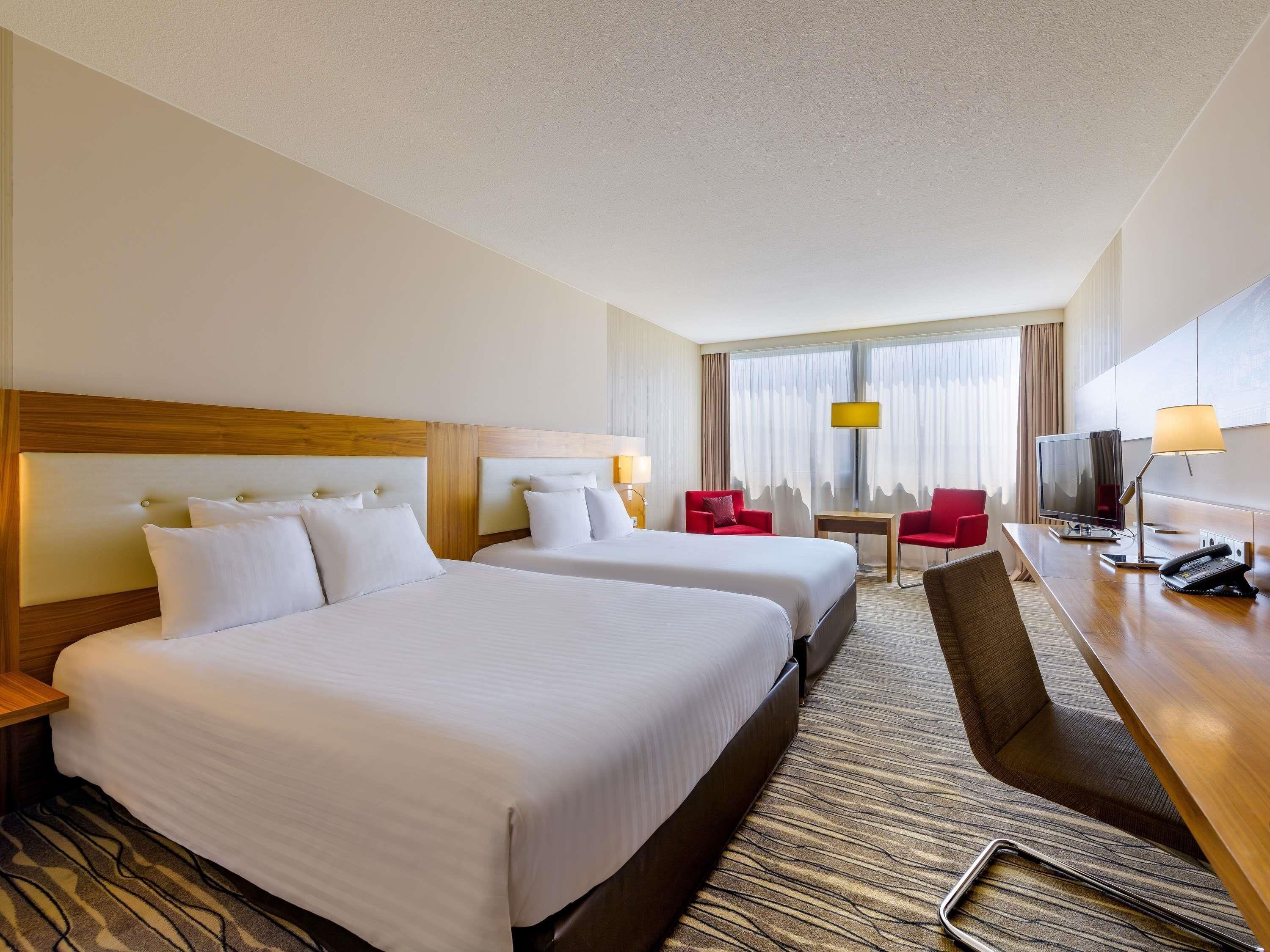 Family Room, 2 Queen Beds | Premium bedding, minibar, in-room safe, desk