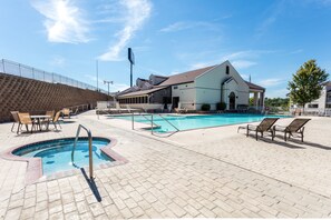 Seasonal outdoor pool, open 9:00 AM to 11:00 PM, pool loungers