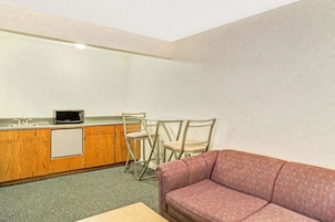 Desk, laptop workspace, blackout drapes, iron/ironing board