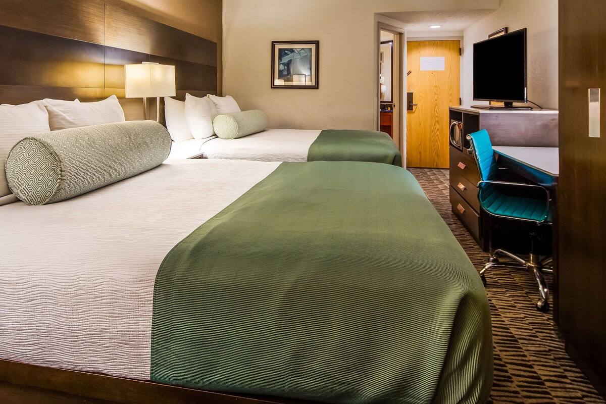 Standard Room, 2 Queen Beds, Non Smoking | Premium bedding, pillowtop beds, desk, blackout drapes