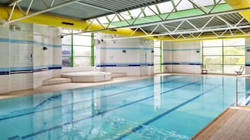 Swimmers can enjoy a refreshing dip in this indoor pool with clear lane markings and a depth indicator.