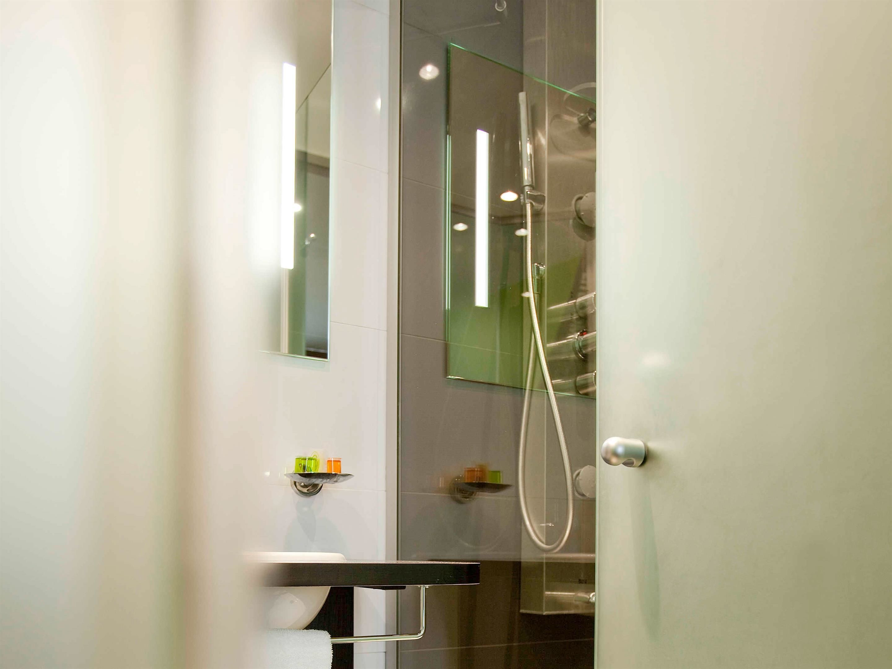 shower, eco-friendly toiletries, hair dryer, towels