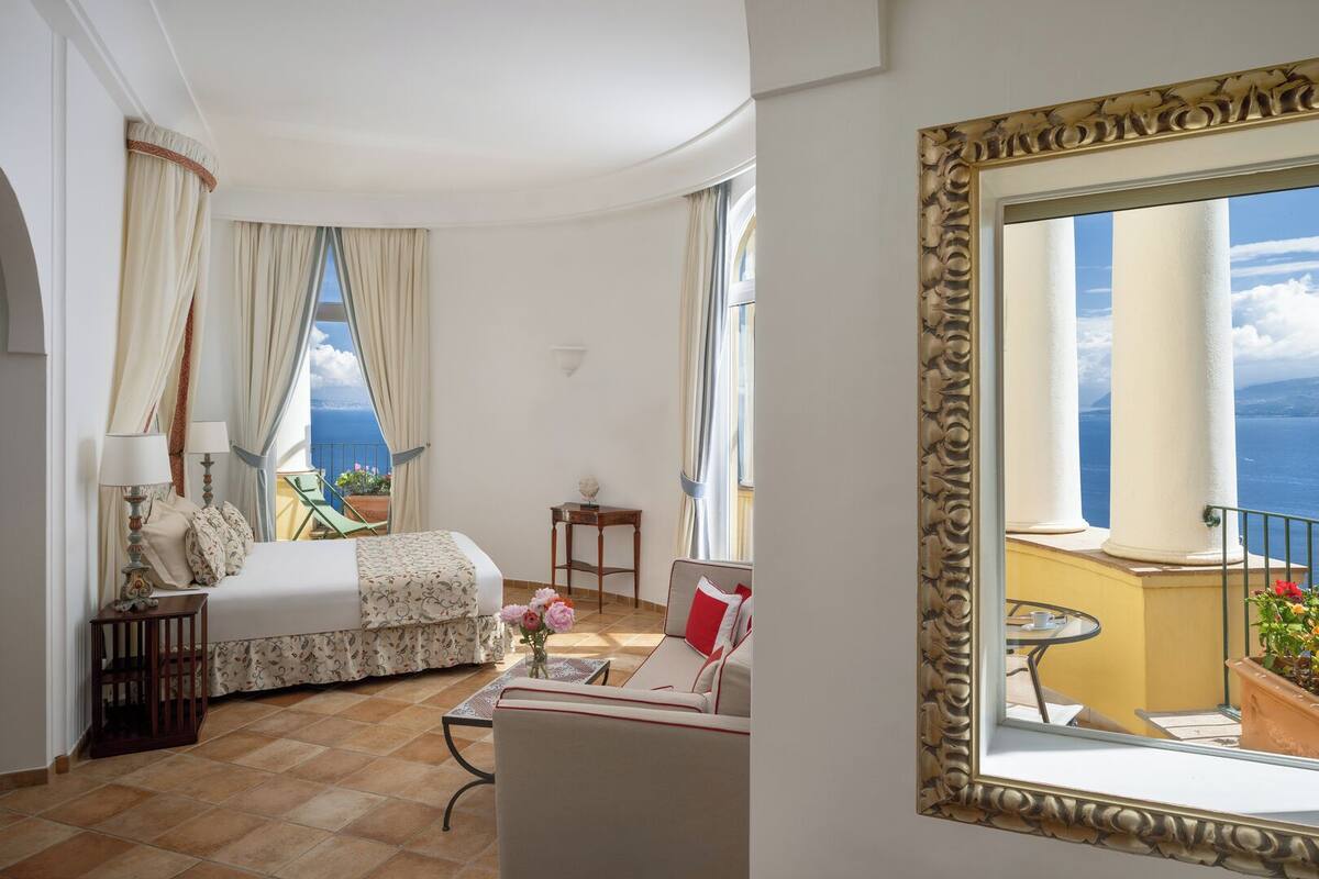 Premium bedding, down comforters, minibar, in-room safe