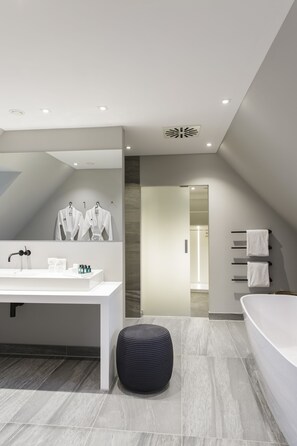 Suite (500) | Bathroom | Designer toiletries, hair dryer, bathrobes, slippers