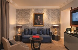 Executive Suite | Living area | 43-inch flat-screen TV with satellite channels, TV, iPad