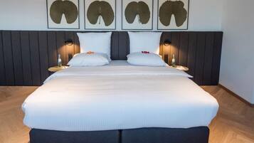 Ropa de cama de alta calidad y minibar