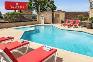 Seasonal outdoor pool, open 9:00 AM to 10 PM, pool umbrellas - Ramada by Wyndham Albuquerque Airport (Albuquerque)