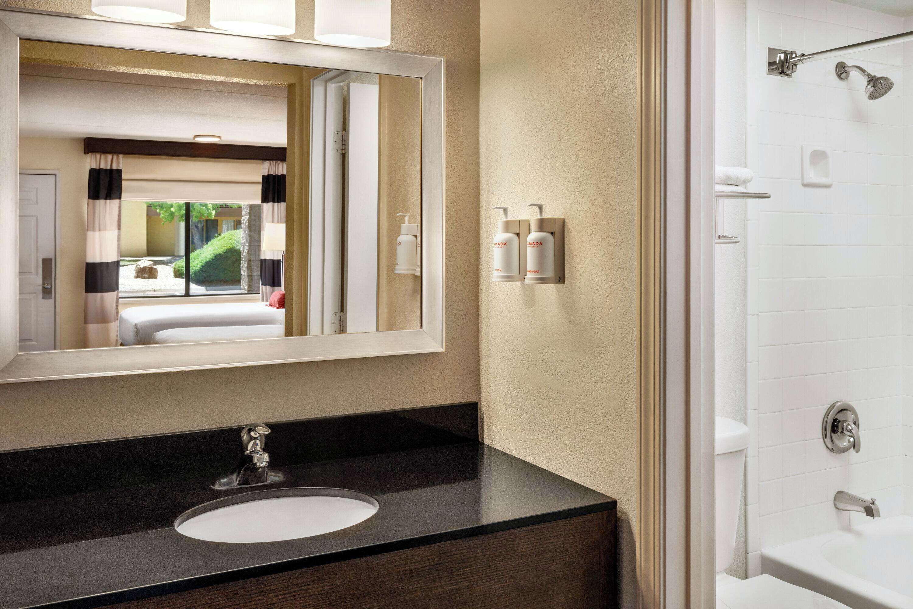 combined shower/bathtub, free toiletries, hair dryer, towels