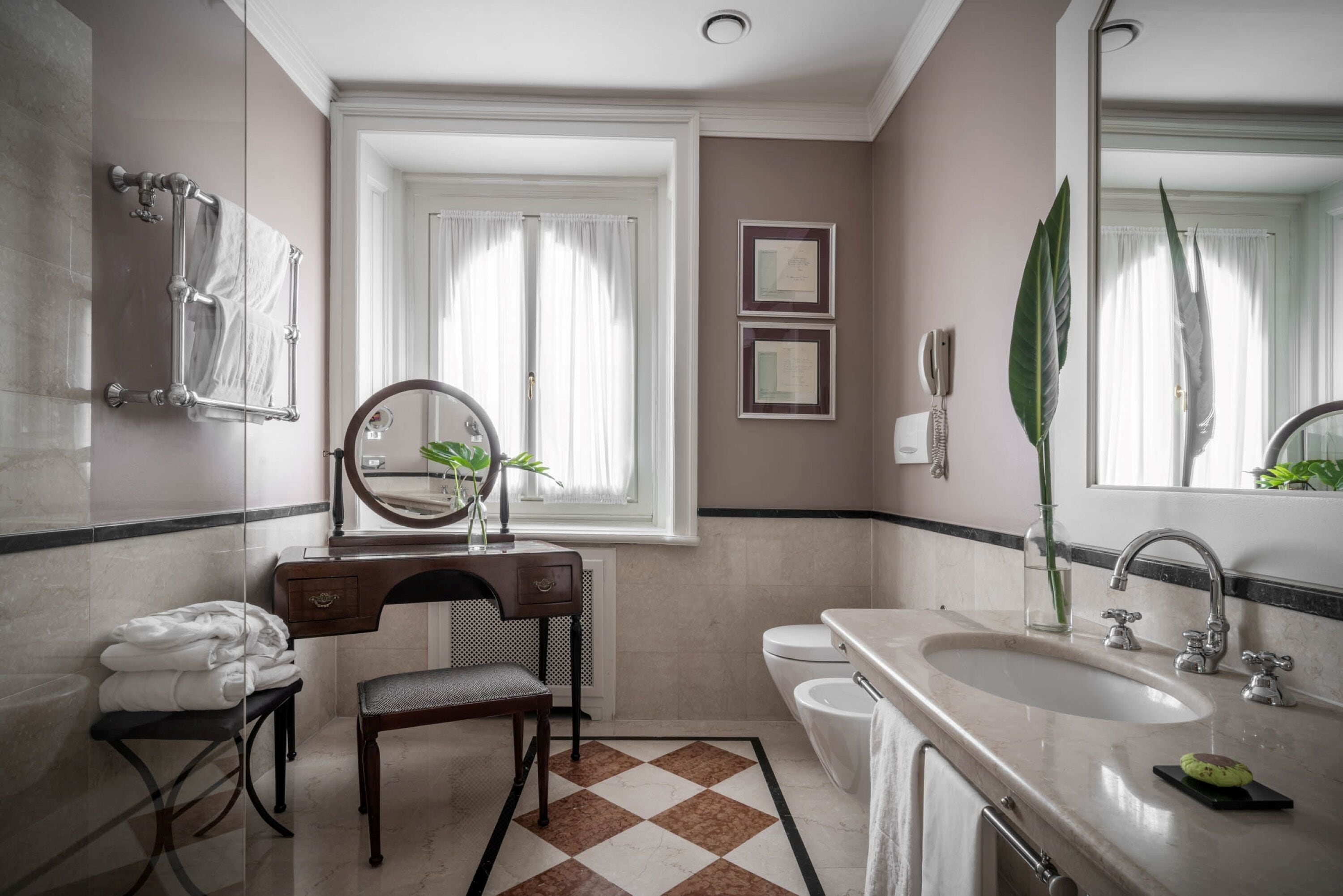 junior suite | bathroom | designer toiletries, hair dryer, bathrobes, slippers