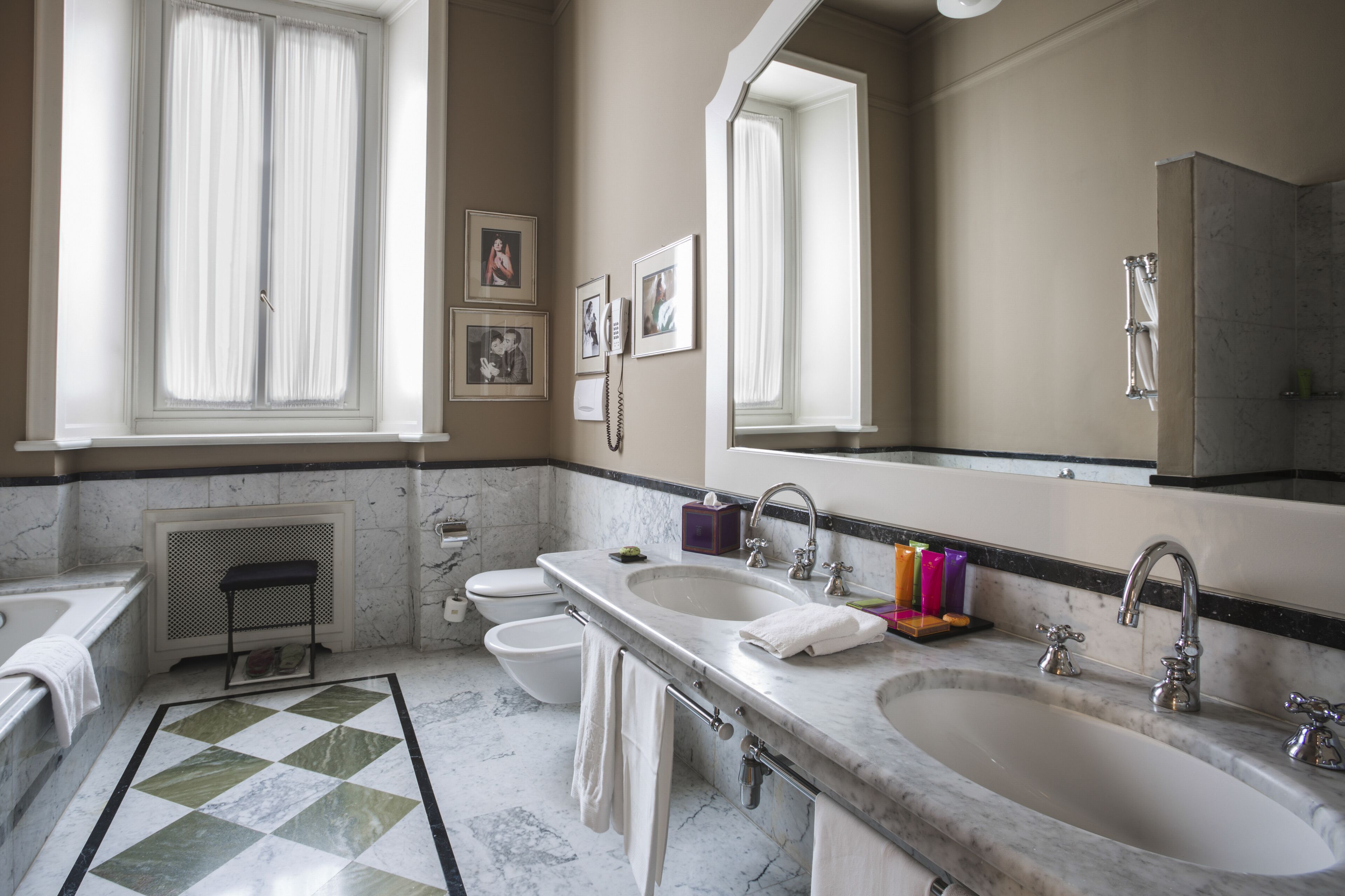 designer toiletries, hair dryer, bathrobes, slippers