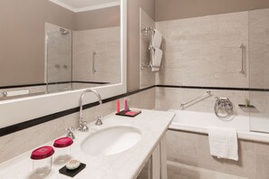Designer toiletries, hair dryer, bathrobes, slippers