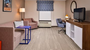 Suite, 1 King Bed with Sofa bed, Non Smoking | Desk, laptop workspace, blackout curtains, iron/ironing board