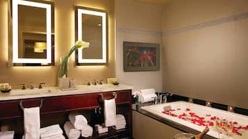 Designer toiletries, hair dryer, bathrobes, towels