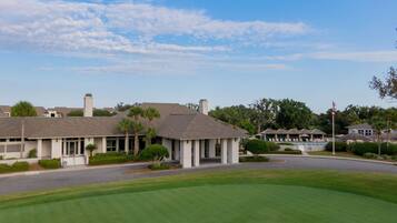 Enjoy a round of golf on our well-maintained course, surrounded by lush greenery and a picturesque clubhouse.