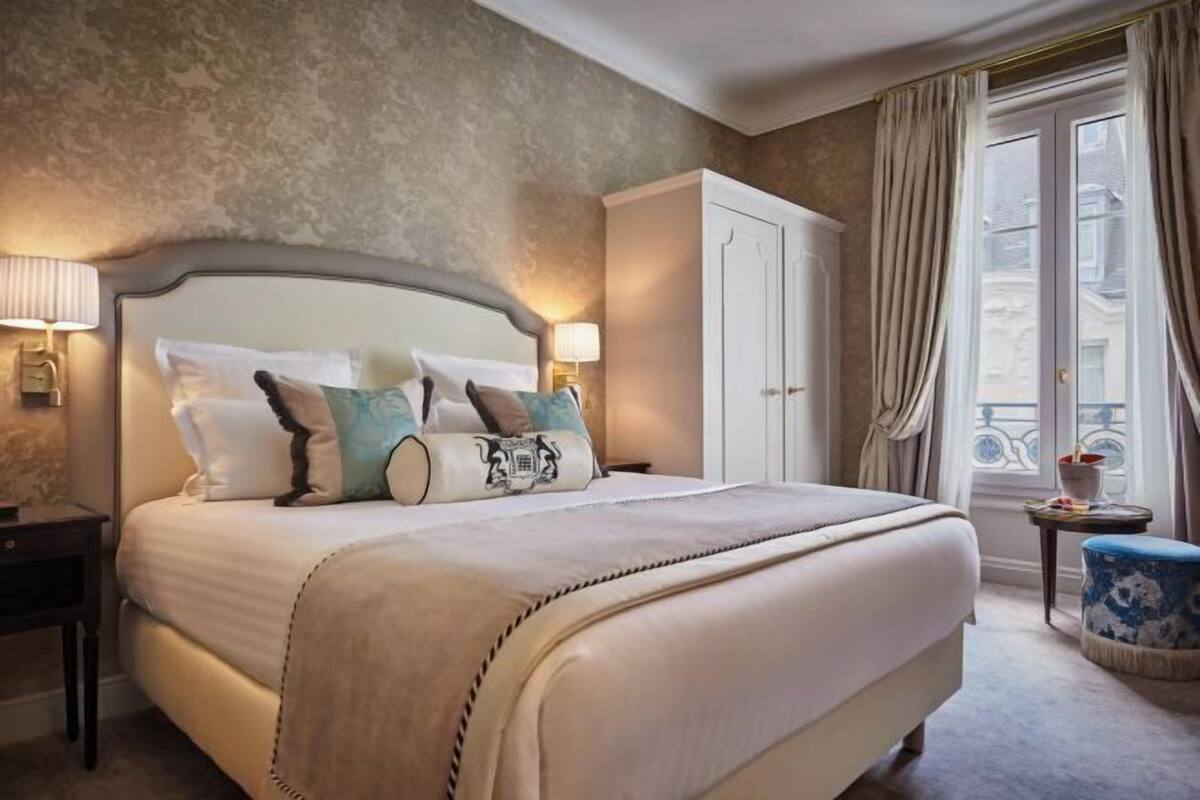 Premium bedding, down comforters, pillowtop beds, minibar