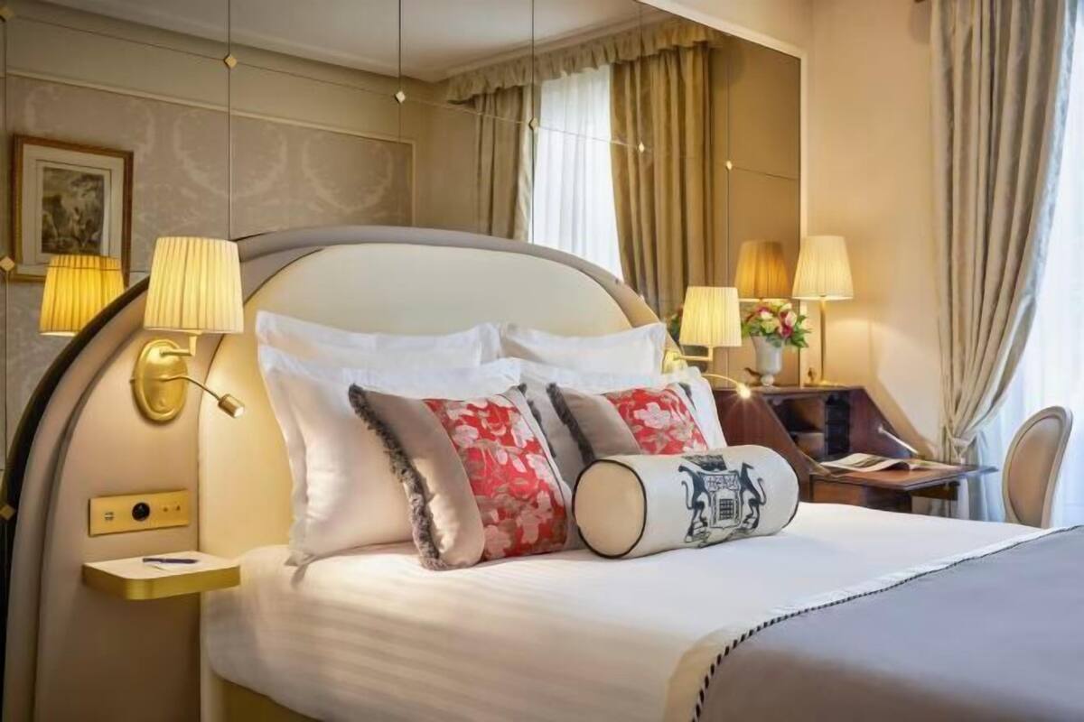 Premium bedding, down comforters, pillowtop beds, minibar