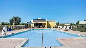 Seasonal outdoor pool, open 11:00 AM to 10:00 PM, pool umbrellas