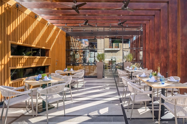 Breakfast, lunch, dinner served; Spanish cuisine, al fresco dining