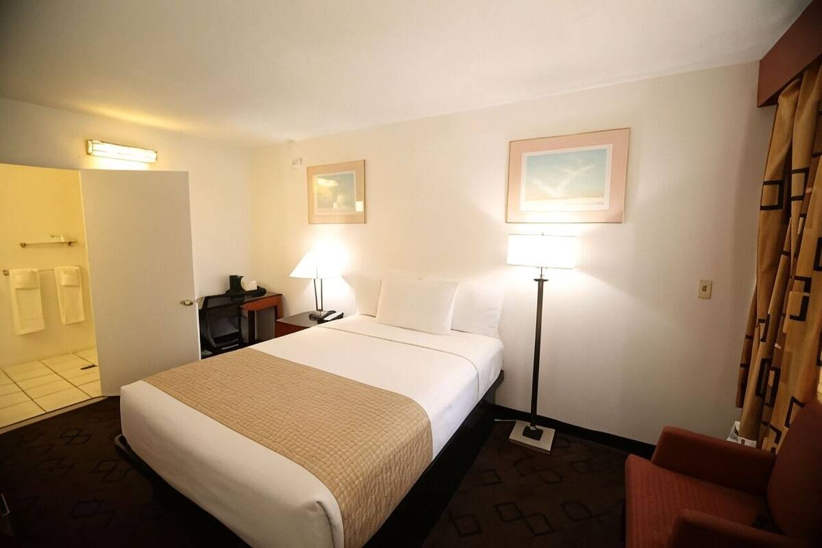 In-room safe, desk, blackout curtains, iron/ironing board (on request)