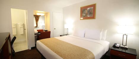 Room, 1 King Bed, Non Smoking | In-room safe, desk, blackout drapes, iron/ironing board