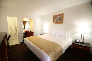 Room, 1 King Bed, Non Smoking | In-room safe, desk, blackout drapes, iron/ironing board