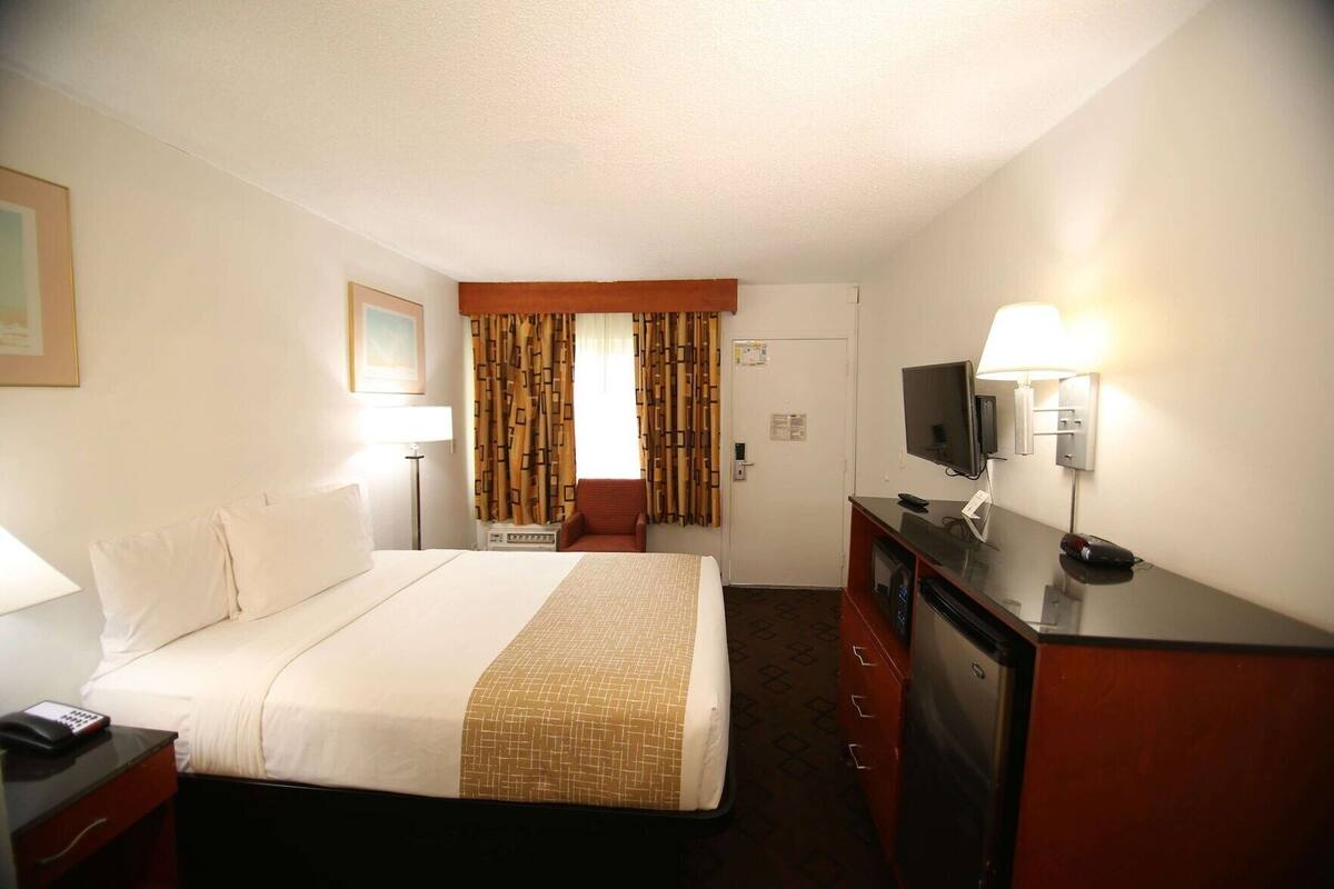 In-room safe, desk, blackout curtains, iron/ironing board (on request)