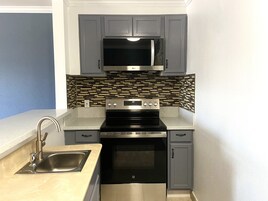 Suite, 1 Bedroom, Non Smoking | Private kitchen | Mini-fridge, microwave, coffee/tea maker