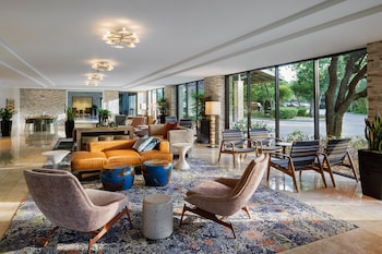 Sitting area in hotel lobby at The Woodlands Resort, Curio Collection by Hilton