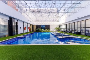 Indoor pool, open 6 AM to 8 PM, pool loungers