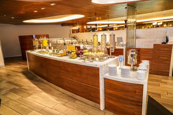 Daily buffet breakfast (USD 24 per person)