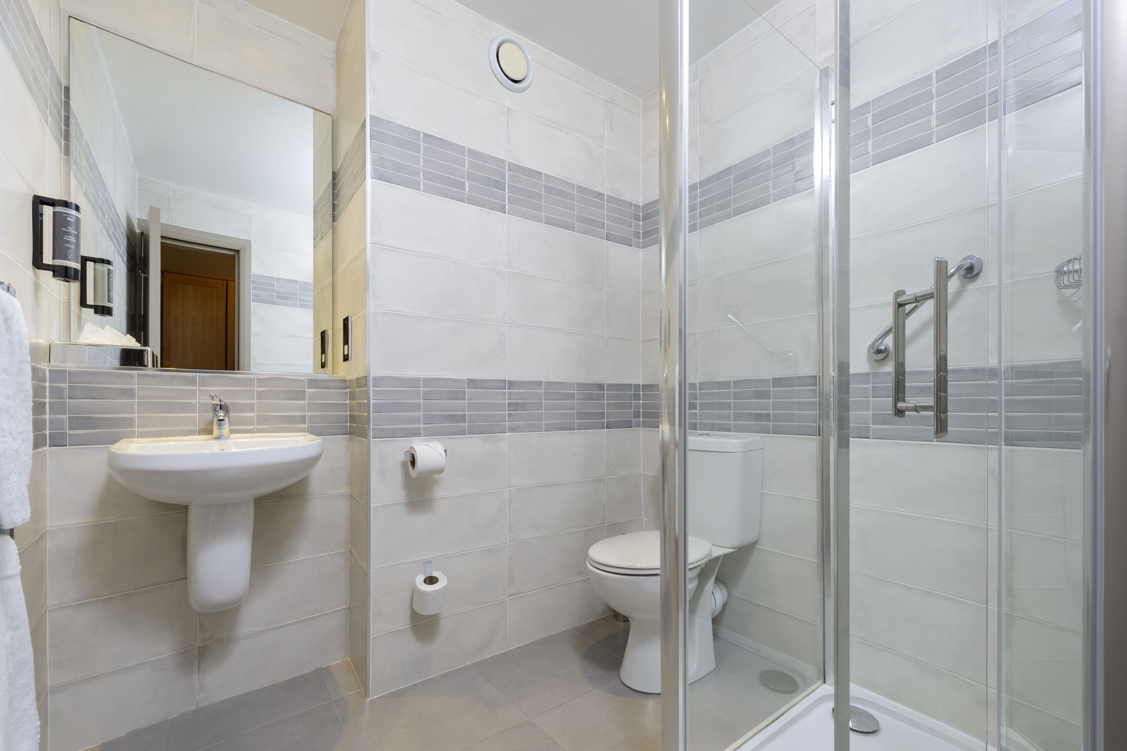 family room | bathroom | hair dryer, towels, soap, shampoo