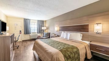 Tabla de planchar con plancha, wifi gratis y ropa de cama